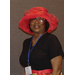 Woman with a large red hat 