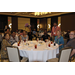 A group of people sitting at a table