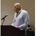 a man speaking at a podium