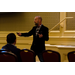 Paul Krismer, Keynote Speaker speaks animatedly to the audience.