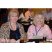 Renee McLemore, HCV Director (MS Region V), Phyliss Mills, Executive Administrative Assistant (MS Region V) sit together and smile.