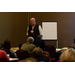 Michael Gifford, C.P.M, CPSD presents 40 Things You May Not Know About Housing Procurement (But Really Need To) to an audience.