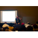 Michael Gifford, C.P.M, CPSD presents 40 Things You May Not Know About Housing Procurement (But Really Need To) to a large audience.