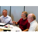 Mark Taylor, ED (Charleston-Kanawha, WV) and two other men sit at a table together.