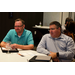 Mike Rabun, Procurement (Augusta, GA), Douglas Freeman, Deputy ED (Augusta, GA) sit at a table together.