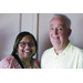 President &amp; CEO Shaundra Clark smiling and standing next to Executive Director Jake Oglesby