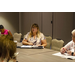 Executive Director Becky-Sue Mercer sitting at a table