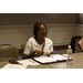 Executive Director Patricia Allen sitting at a table