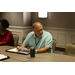 Executive Director Russel Nast sitting at a table