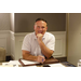 Executive Director Michael A. Boatwright sitting at a table smiling