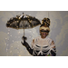 One woman wearing a mask and holding an umbrella