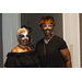 Two women wearing masks and smiling