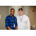 Two men standing side by side for a photo.