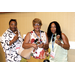 Three women posing for a photo.