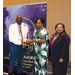 A man and a woman accepting an award.