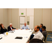  People seated around a table for the Legislative Committee meeting. 