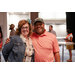  Anthony Goodson, Jr. smiling with his arm around a woman in a jean jacket. 