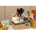  A view of raffle basket Number 10. A Virginia Gift Basket, a Virginia is for lovers hat, a Walmart gift card, and a mug.  