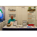  A man smiling in the Cauthen and Associates booth.  