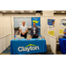  Ramsey stands and smiles next to another gentleman in the Clayton Booth. Leading the Way in Attainable Housing Solution. Nationwide Service. 
