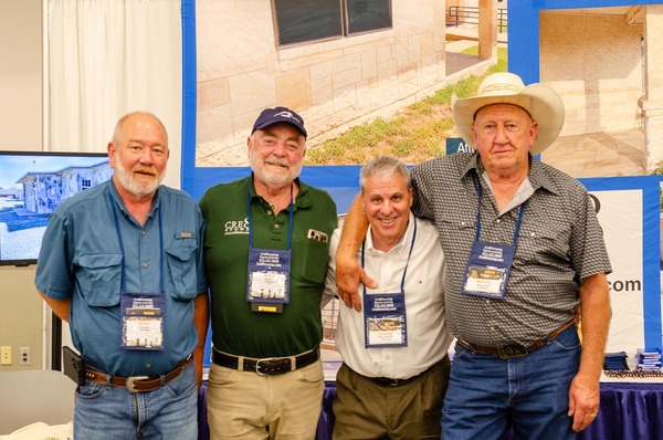 Woody, Darryl, Gary and Dale smile for a photo.