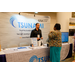  Michael talking with a woman at the Tsunami Booth. Plug and Play Surveillance. 