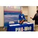  Joe smiles at the PHA-Web booth. Better Software. Better Service. Elevate your housing software experience. 